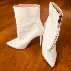 White Heeled booties with studded trim